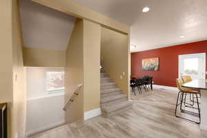 Staircase with wood-type flooring