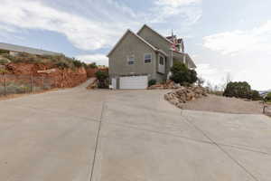 View of home's exterior featuring a garage