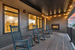 Deck at dusk with a porch