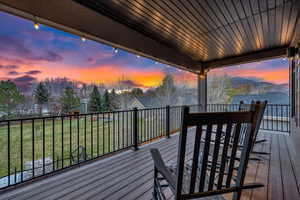 Deck at dusk with a mountain view