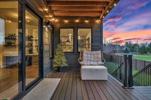 View of deck at dusk