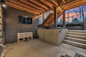 Interior space featuring a healthy amount of sunlight and concrete floors