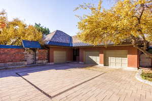 View of front of property featuring a garage