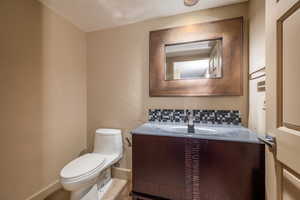 Bathroom with vanity and toilet