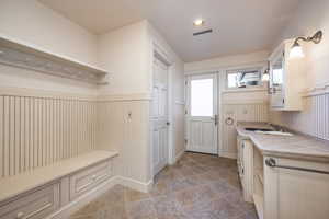 Mudroom featuring sink