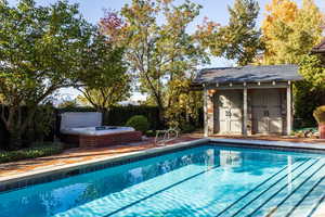 View of pool with an outdoor structure