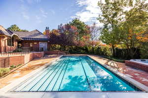 View of pool featuring a patio