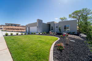 View of front of property featuring a front yard