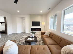 Living room with light wood-type flooring