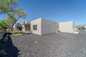 Back of property featuring a patio area