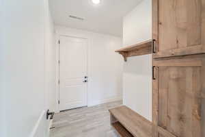 Mudroom featuring light hardwood / wood-style floors