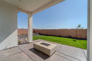 View of patio / terrace featuring an outdoor fire pit