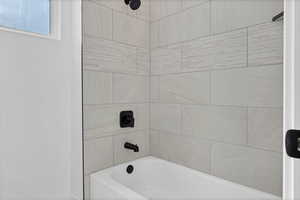 Bathroom with shower / tub combination