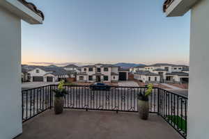 View of balcony at dusk