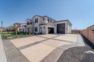 Mediterranean / spanish house featuring a balcony