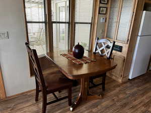 Dining room featuring dark hardwood / wood-style floors