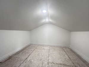 Bonus room featuring vaulted ceiling