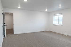 Spare room with carpet floors