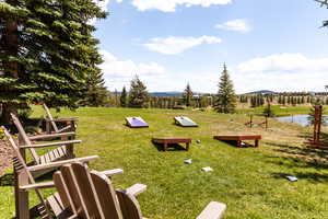 View of yard featuring a water and mountain view