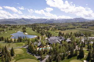 Bird's eye view featuring a water and mountain view