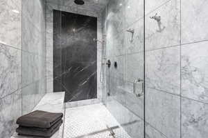 Bathroom featuring a shower with shower door