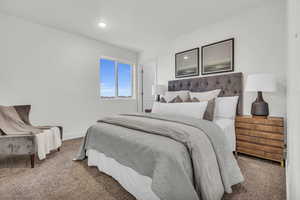 Bedroom featuring carpet