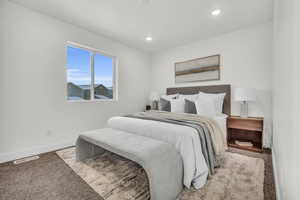 View of carpeted bedroom