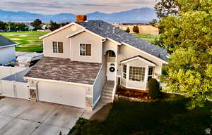 View of front of property with a mountain view