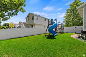 View of yard featuring a playground