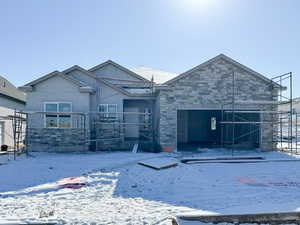 View of front of home with a garage