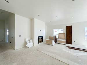 Unfurnished living room with a fireplace