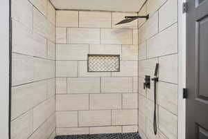 Bathroom with a tile shower