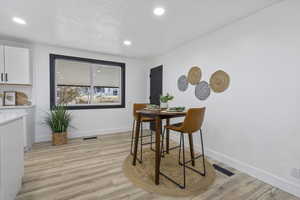 Dining room featuring light hardwood / wood-style floors