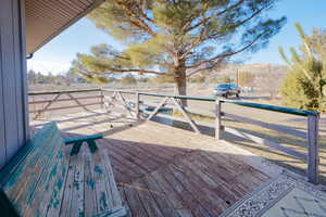 Wooden deck featuring a mountain view