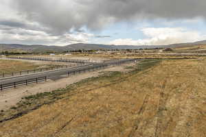 View of yard with a mountain view and a rural view