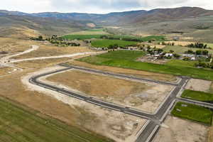 Aerial view featuring a mountain view and a rural view