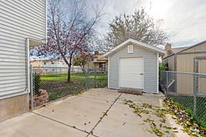 Exterior space featuring a shed