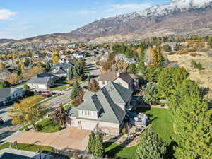 Birds eye view of property with a mountain view