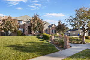 View of front of house with a front lawn