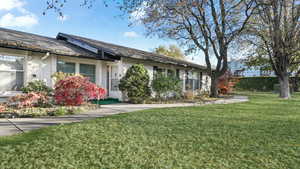 View of front of home with a front lawn