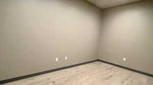 Unfurnished room featuring light hardwood / wood-style floors