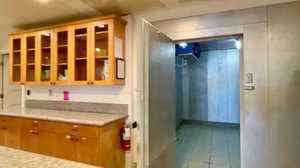 Kitchen with tile patterned floors