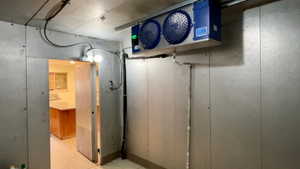 Basement featuring light tile patterned floors