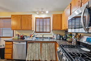 Kitchen with stainless steel appliances and sink