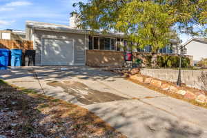 Single story home with a garage