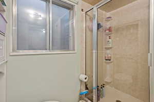 Bathroom with an enclosed shower