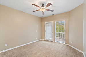 Primary Bedroom with access to private balcony