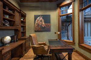 Office area featuring light hardwood / wood-style flooring