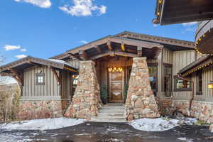 View of snow covered property entrance