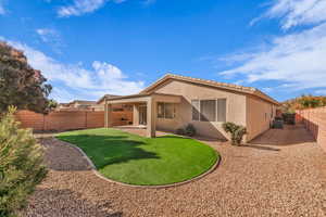 Rear view of property featuring a patio and cooling unit